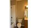 Full bathroom featuring a shower-tub combo, toilet, and vanity with chrome fixtures at 6957 Northwich Dr, Windermere, FL 34786