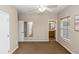 Bedroom with ceiling fan, ensuite bath and lots of light at 6957 Northwich Dr, Windermere, FL 34786