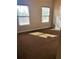Spacious bedroom featuring plush carpet, natural light and a neutral color palette at 6957 Northwich Dr, Windermere, FL 34786