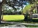 Community park with a large grassy area, soccer field, and walking paths for outdoor recreation at 6957 Northwich Dr, Windermere, FL 34786