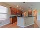 Modern kitchen with stainless steel appliances, a kitchen island, and dark countertops at 6957 Northwich Dr, Windermere, FL 34786