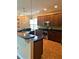Spacious kitchen with stainless steel appliances and granite countertops, perfect for cooking at 6957 Northwich Dr, Windermere, FL 34786