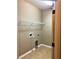 Laundry room featuring tile flooring and connections for a washer and dryer at 6957 Northwich Dr, Windermere, FL 34786