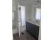 Modern bathroom vanity with gray cabinets and a white countertop at 710 Whispering Pines Dr, Auburndale, FL 33823