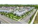Aerial view of a residential neighborhood with well-manicured lawns and sidewalks at 7400 Estuary Lake Loop, Celebration, FL 34747