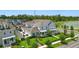 Aerial view of lakeside community with townhomes and green spaces at 7400 Estuary Lake Loop, Celebration, FL 34747