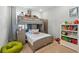Cozy bedroom featuring a bunk bed and playful decor, perfect for children at 7400 Estuary Lake Loop, Celebration, FL 34747