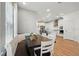 Bright dining area with booth seating and easy access to the modern kitchen, creating a perfect space for meals at 7400 Estuary Lake Loop, Celebration, FL 34747