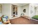 Inviting patio with comfortable seating arrangements and easy access to indoor living at 7400 Estuary Lake Loop, Celebration, FL 34747