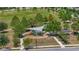Community playground with modern equipment, surrounded by green space and trees at 8042 Glenlloyd Ave, Winter Garden, FL 34787
