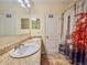 Bathroom featuring a double sink vanity, and separate shower/toilet room at 810 Jefferson Blvd, Haines City, FL 33844