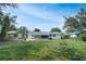 Spacious backyard view of the property featuring the lawn at 818 Ballard St, Altamonte Springs, FL 32701
