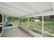 The screened patio offers a view of the backyard at 818 Ballard St, Altamonte Springs, FL 32701