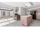 Spacious kitchen with an island, stainless oven, and a sliding glass door to the outside at 8310 Happy Trails, Kissimmee, FL 34747