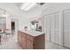 Roomy kitchen with an island, plenty of storage, and a breakfast nook area at 8310 Happy Trails, Kissimmee, FL 34747