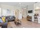 Inviting living room with neutral walls, tile floors and comfortable seating that offers a relaxing retreat at 833 Brunello Dr, Davenport, FL 33897