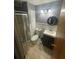 Bathroom features a toilet, vanity, mirror, shower and neutral color scheme at 848 Wildabon Ave, Lake Wales, FL 33853