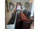 Dining room with large table, chairs, bench, and window at 848 Wildabon Ave, Lake Wales, FL 33853