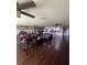Open floor plan featuring the living room and kitchen, with hardwood floors and plenty of space at 848 Wildabon Ave, Lake Wales, FL 33853