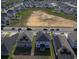 Overhead view of new homes under construction in a residential area at 895 Overpool Ave, Davenport, FL 33896