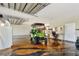 Spacious garage with epoxy flooring, a golf cart, and ample room for parking and storage at 955 Mansfield Rd, Tavares, FL 32778