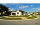Well-maintained corner lot with landscaped lawn, sidewalk, and a charming single-story home, creating inviting curb appeal at 1025 Belvoir Dr, Kissimmee, FL 34744