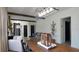 Well-designed living space with an open layout, showcasing modern decor and stylish furnishings for comfortable living and entertaining at 1025 Belvoir Dr, Kissimmee, FL 34744
