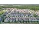 Aerial view of a community showcasing the neighborhood's layout and green spaces at 11037 Bagley Aly, Windermere, FL 34786