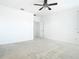 Bright bedroom with carpet flooring, a ceiling fan, and ensuite bathroom access at 11037 Bagley Aly, Windermere, FL 34786