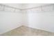 Walk in closet with wire shelving and neutral carpet at 11037 Bagley Aly, Windermere, FL 34786
