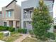 Exterior shot of the two-story home, showcasing its modern design and neat landscaping at 11037 Bagley Aly, Windermere, FL 34786