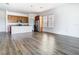 Open concept space combining kitchen with stainless steel appliances and a spacious living area at 11037 Bagley Aly, Windermere, FL 34786