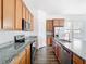 Modern kitchen featuring granite countertops, stainless steel appliances and plenty of cabinet space at 11037 Bagley Aly, Windermere, FL 34786