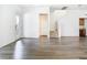 Open-concept living area with hardwood floors and abundant natural light at 11037 Bagley Aly, Windermere, FL 34786