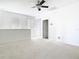 Spacious loft area with ceiling fan, carpet flooring, and natural light at 11037 Bagley Aly, Windermere, FL 34786