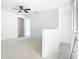 Upstairs loft with fan and bright carpeted floor, perfect for a quiet area at 11037 Bagley Aly, Windermere, FL 34786