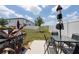 Fenced backyard with patio furniture and well-maintained lawn at 1113 Merrill St, Davenport, FL 33837