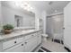 Well-maintained bathroom with good lighting, neutral colors, and vanity at 1113 Merrill St, Davenport, FL 33837