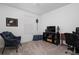 Bedroom with comfortable seating area and natural light at 1113 Merrill St, Davenport, FL 33837