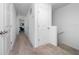 Upstairs hallway with plush carpet and multiple doors at 1113 Merrill St, Davenport, FL 33837