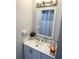Cozy bathroom with vanity, cabinet, and modern fixtures at 1126 Orwell Ave, Orlando, FL 32809