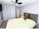 Comfortable bedroom with a ceiling fan, closet, and tile flooring at 1126 Orwell Ave, Orlando, FL 32809