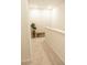 Upper hallway space with soft carpet, neutral walls and natural light at 11378 Whistling Pine Way, Orlando, FL 32832
