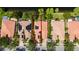 Aerial view of houses with terracotta roofs, solar panels, and neighborhood street at 12041 Kajetan Ln, Orlando, FL 32827