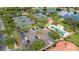 Aerial view showing the community tennis courts and pool area with ample parking at 12041 Kajetan Ln, Orlando, FL 32827