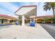 Gas station featuring modern gas pumps with an overhang and nearby businesses at 12041 Kajetan Ln, Orlando, FL 32827