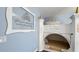 Magical castle bunk beds with Cinderella wall art and blue accents for a fairy-tale bedroom at 1228 Castle Pines Ct, Reunion, FL 34747