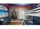 themed bedroom includes bunk beds and Star Wars decor at 1228 Castle Pines Ct, Reunion, FL 34747