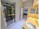 Bathroom featuring double sinks, a tiled shower, and a bright, clean aesthetic at 13940 Corrine Key Pl, Orlando, FL 32824