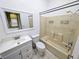Bathroom featuring a vanity, toilet, and a bathtub-shower combination at 13940 Corrine Key Pl, Orlando, FL 32824
